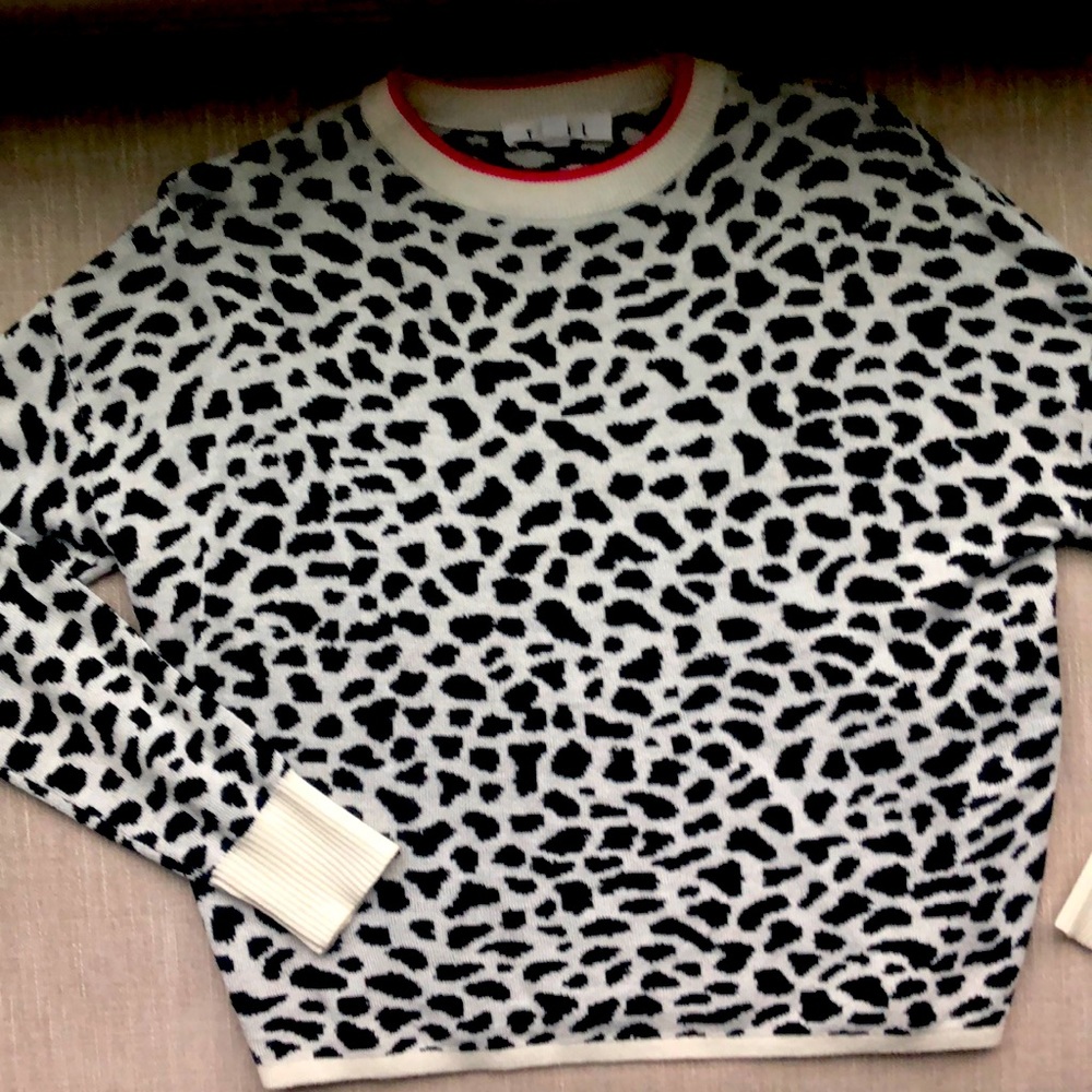 THML size xs animal print sweater black and white pink trim around collar
